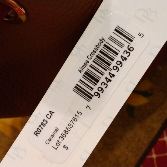 NEW! Dooney & Bourke Draw String Crossbody Pebble Leather bag NWT - Picture 9 of 9